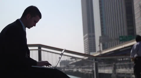 Business Man Using Laptop - Close Silhouette Shot Vidéo 22760049