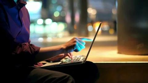 Business man using laptop computer after work at night Stock Footage 267821381