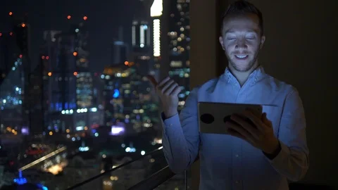 Business Man Using Mobile Device in City Office for Video Chatt Talking Stock Footage 103600459