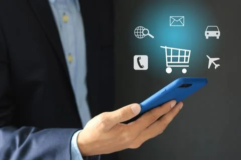 Business man using mobile smartphone with internet web icons, globalization.. Stock Photos