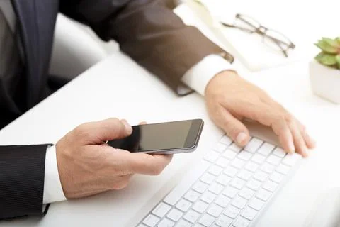 Business man using modern smartphone Stock Photos
