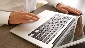 Business man using mouse pad laptop Stock Footage 85954417