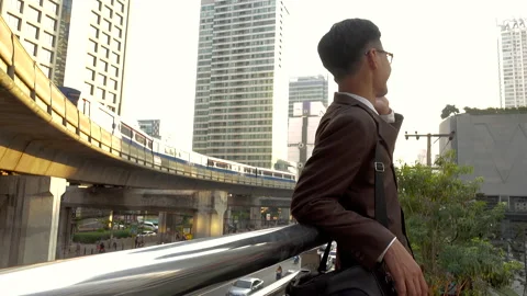 Business man using smart phone in modern city Stock Footage 132637051