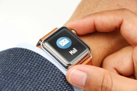 Business man using smart watch Stock Photos
