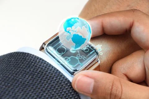 Business man using smart watch Stock Photos