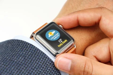 Business man using smart watch Stock Photos