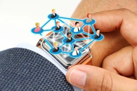 Business man using smart watch Stock Photos