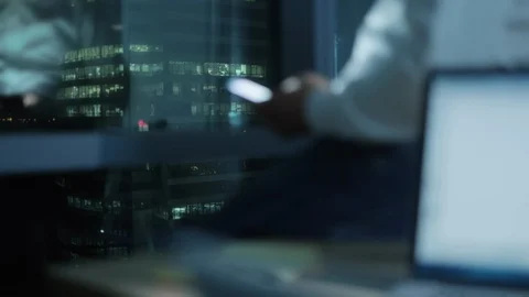 Business Man Using Smartphone For Fun In Office At Night Stock Footage 98895751