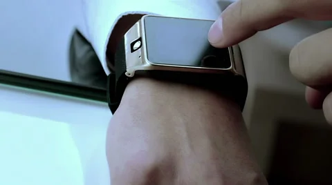 Business man using smartwatch app Stock-Footage 63529241