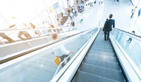 Business man using a staircase Stock Photos