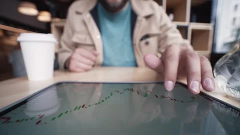 Business Man Using Tablet Computer and Hands Touching Screen to Look at Bitcoin Stock Footage 272402835