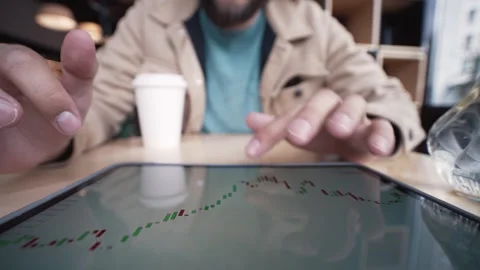 Business Man Using Tablet Computer and Hands Touching Screen to Look at Bitcoin Stock Footage 273659942