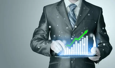 Business man using tablet computer to work with financial data Illustrazione stock