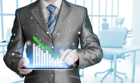 Business man using tablet computer to work with financial data イラスト素材