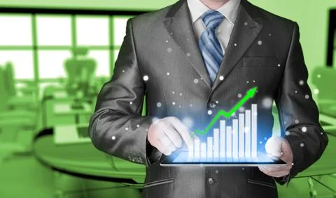 Business man using tablet computer to work with financial data イラスト素材