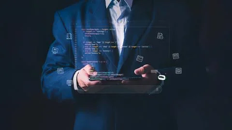 Business man using tablet with digital code and icons Stock-Fotos