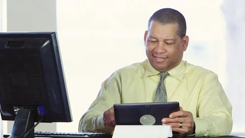Business man using tablet Stock Footage 80227433