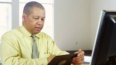 Business man using tablet Stock Footage 80268412