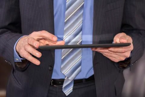 Business man using tablet Stock Photos