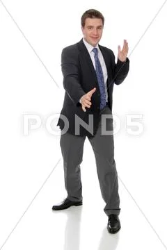 Business man wearing dark suit, isolated over white background Stock Photos