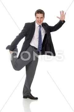 Business man wearing dark suit, isolated over white background Stock Photos