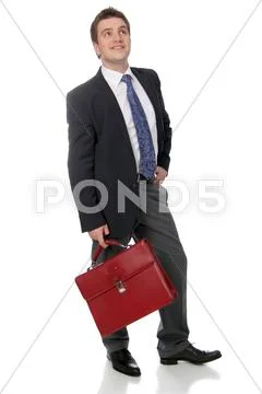 Business man wearing dark suit, isolated over white background Stock Photos