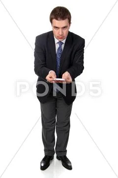 Business man wearing dark suit, isolated over white background Stock Photos