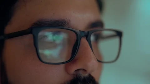 Business man wearing glasses with reflection using computer developing code. Stock Footage 264866643