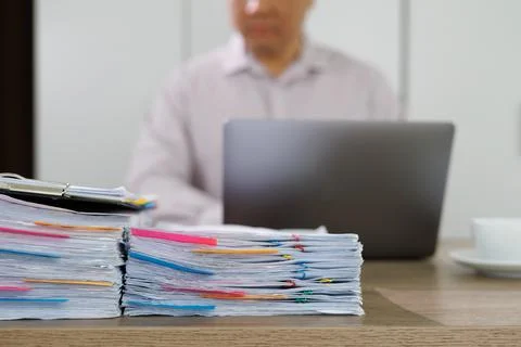 Business man work Documents checking document paperwork report for analysis   Foto stock