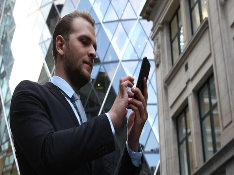 Business Man Work Internet Mobile Phone City Architecture Old and New Building Video stock 73599205