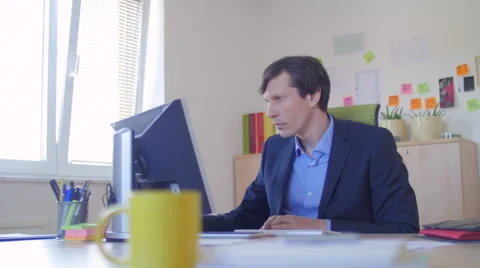 Business man working by the computer Stock Footage 49726430