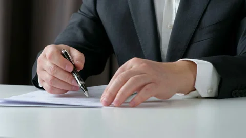 Business man working on documents, close up Stock Footage 103132101
