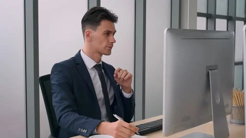 Business man working in front of computer typing on keyboard. Stock Footage 161322868