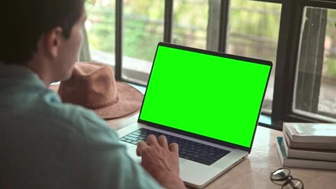 Business Man Working on Laptop Computer with Green Screen and Typing on Keyboard Stock Footage 256115367