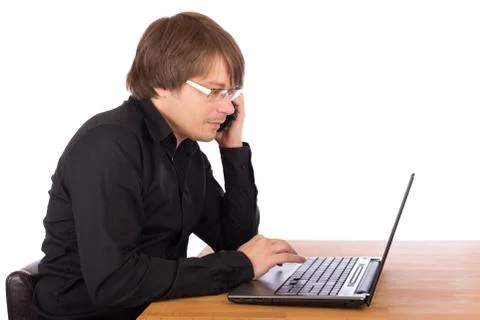 Business man working on a laptop Stock Photos