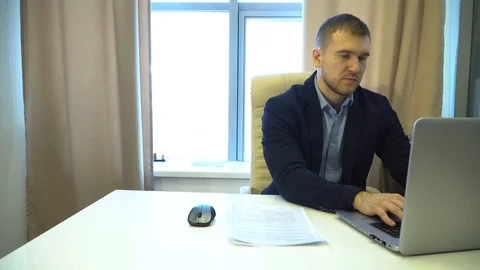 Business man working in the office in front of computer Stock Footage 85669684