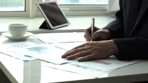 Business man working with paper work in the office Video stock 87739455