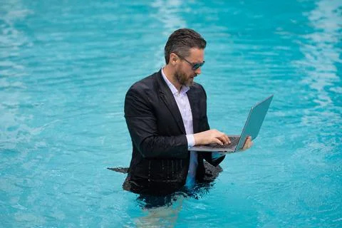 Business man working remote with computer. photo of business man working remote Stock Photos