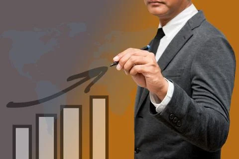 Business man writing on interactive screen with business graph Stock Photos