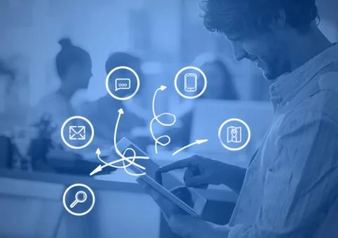 Business man writing on tablet with graph overlays 스톡 사진