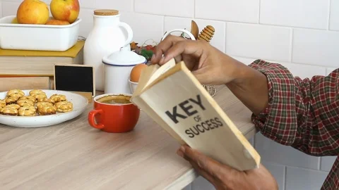 Business manager reading book and drinking coffee.  Stock Footage 101724986