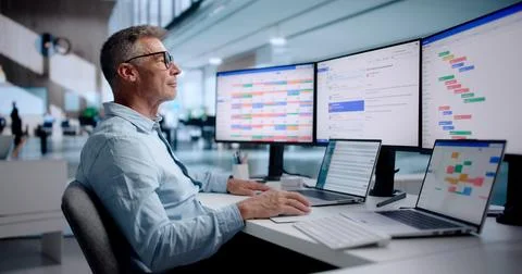 Business Manager Schedules Client Emails On Laptop, Ensuring Secure Communica Stock Photos