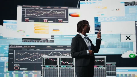 Business manager showing graphs on digital screens at event Stock Footage 318934237