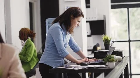 Business manager working with executive data on pc Stock Photos
