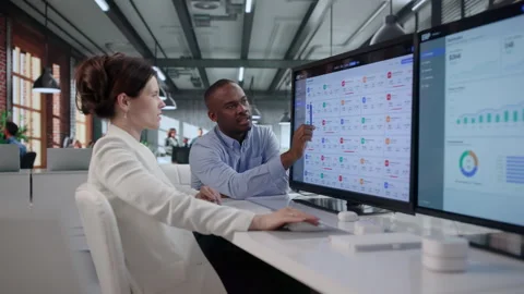 Business Managers Discuss Integrated ERP System On Computer Stock Footage 342977262