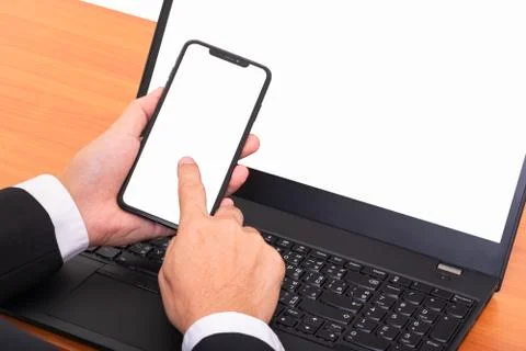 Business man's hands using smart phone for business at office desk Foto stock