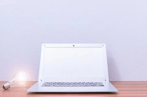 Business man's notebook computer is at the desk Stock Photos