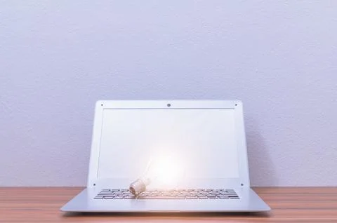 Business man's notebook computer is at the desk Stock Photos