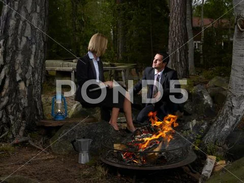 Business Meeting By A Camp Fire