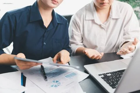 Business meeting, data analytics or women with graph presentation in office.. Stock Photos